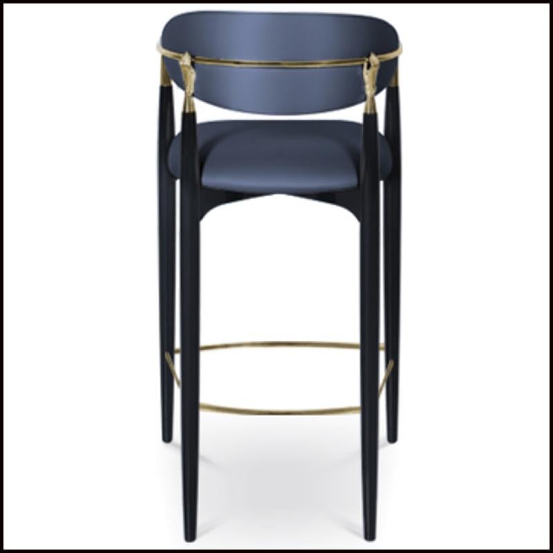 Bar stool in metal lacquer frame complete with two hand details
Structure: High gloss black lacquer with gold brass detail
Fabric: Satina lux smoked grey
Options
Structure: Any RAL color reference high gloss or matte finish with gold, cooper or