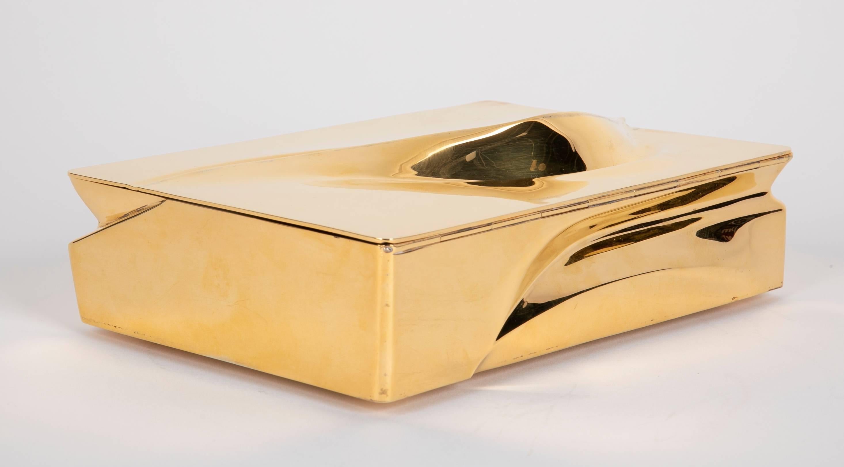 A vermeil (gilt sterling silver) Mnemos 02 jewelry box; segmented in organic forms with satinwood and suede compartments. Designed and produced in 2008 by Asymptote for Meta.