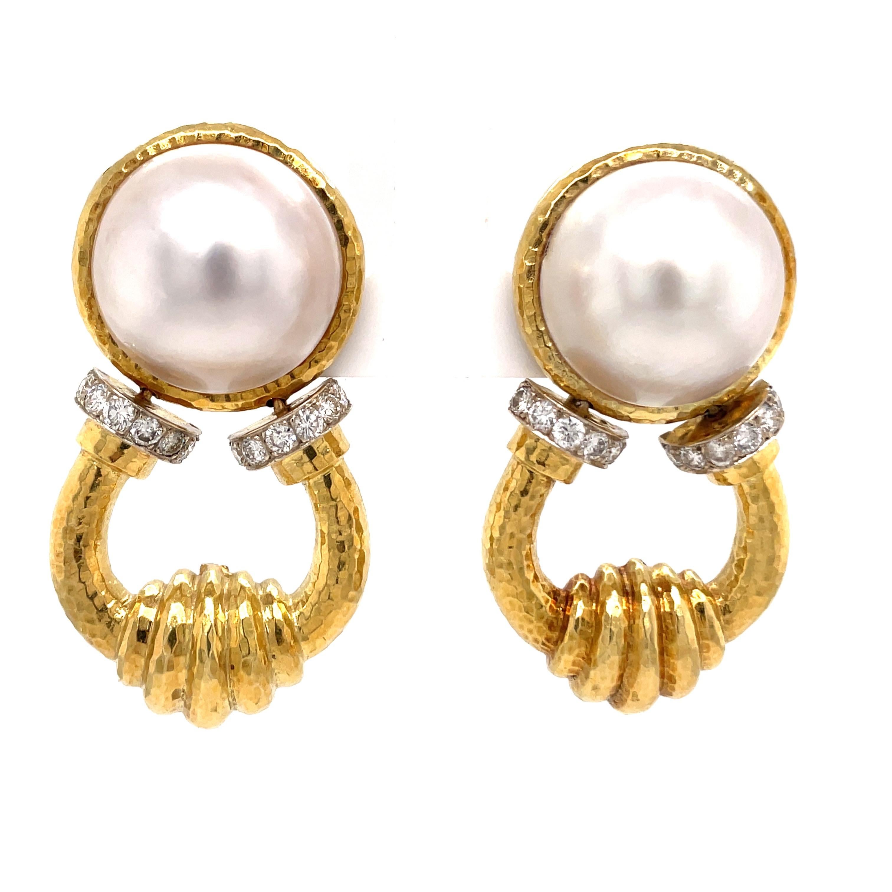 18 Karat Yellow Gold Doorknocker earrings featuring two mob pearls in a hammer motif weighing 41.1 grams.  