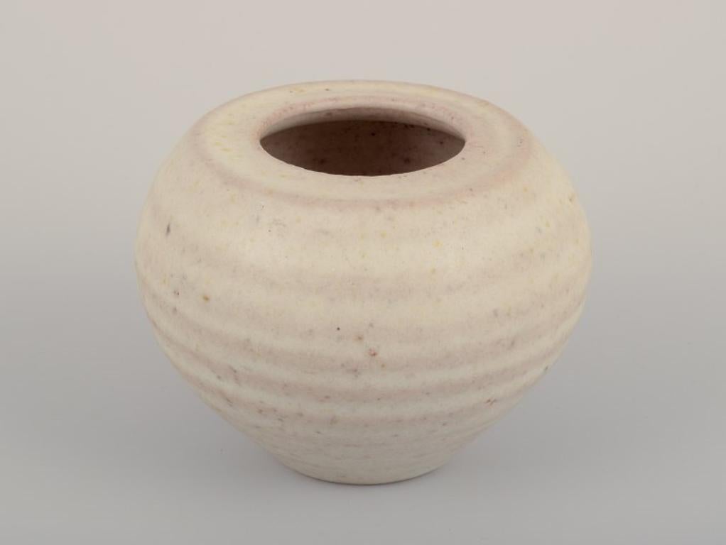 Dutch Mobach, Netherlands. Two ceramic vases with glaze in light tones.
