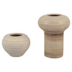 Mobach, Netherlands. Two ceramic vases with glaze in light tones.