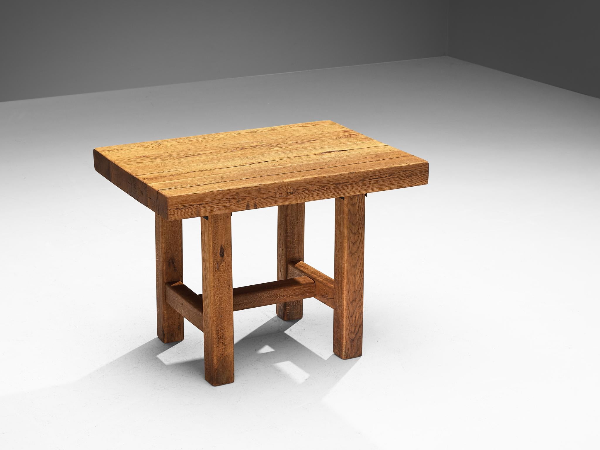 Mobichalet, dining table, oak, Belgium, 1950s

This rustic table will come forward nicely in a relaxing atmosphere, like a patio or a studio space. The brutalist appearance is expressed through robust forms and strong lines. The viewer can follow
