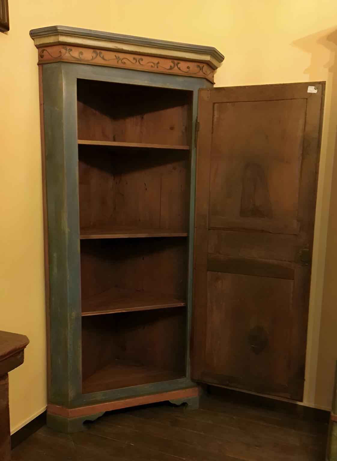Corner decorated late 19th century period.
Place of origin Italy, South Tyrol.
Painted fir corner cabinet with walnut door.
Painted bluish color corner cabinet with door divided into 3 panels with floral motifs.
Shelf feet, 3 interior