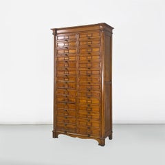 Italian modern walnut wood archive cabinet with brass details, 1940s