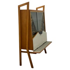 Sliding glass bar cabinet with decoration. Crafts Northern Italy 1950s
