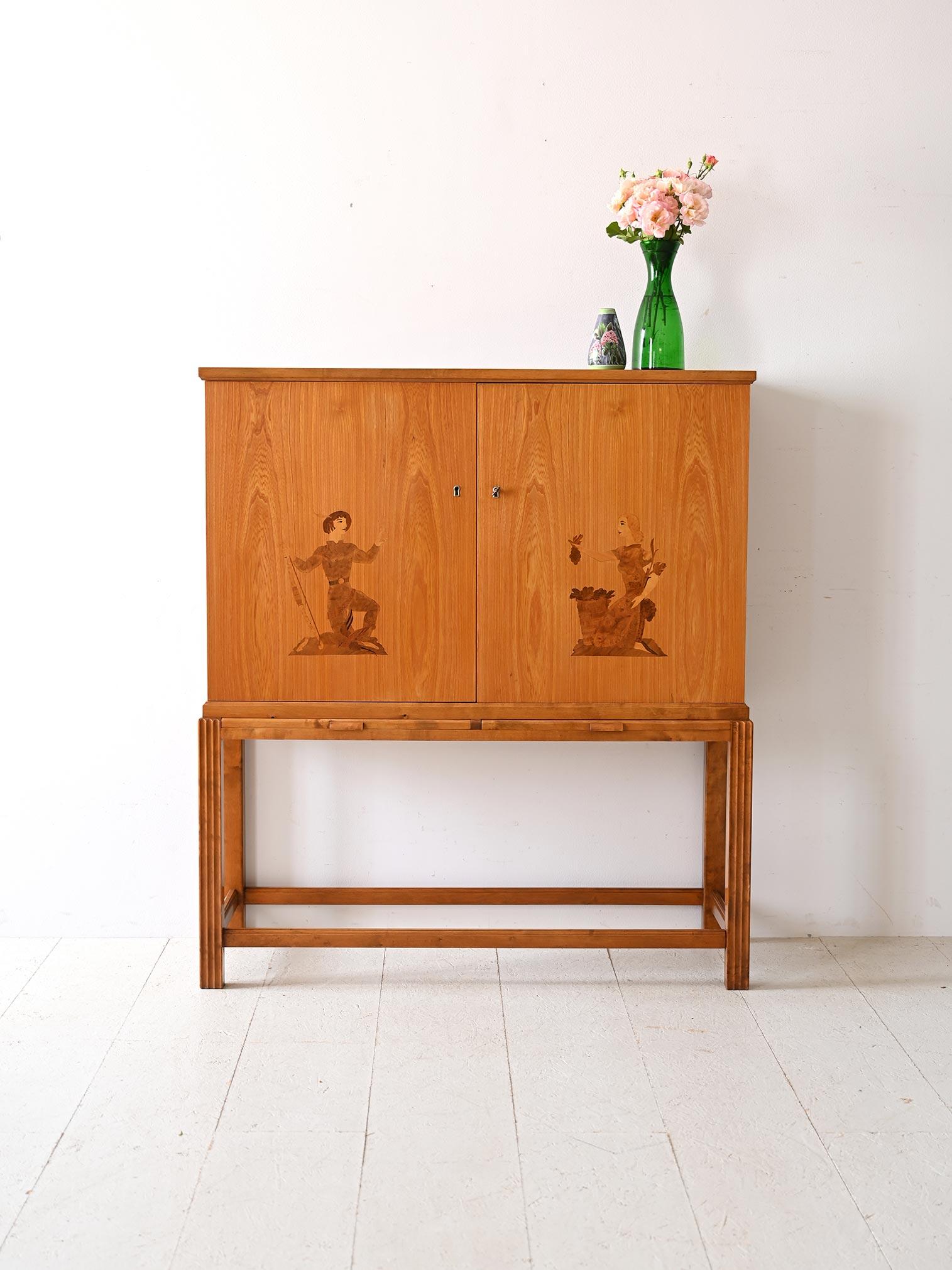 Vintage cabinet with lockable hinged doors.                                                                                                                                                      With a square and solid structure, this piece of