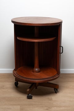 Teak swivel bar cabinet,  C1960's