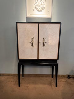 Meuble de bar en parchemin et bois ébonisé