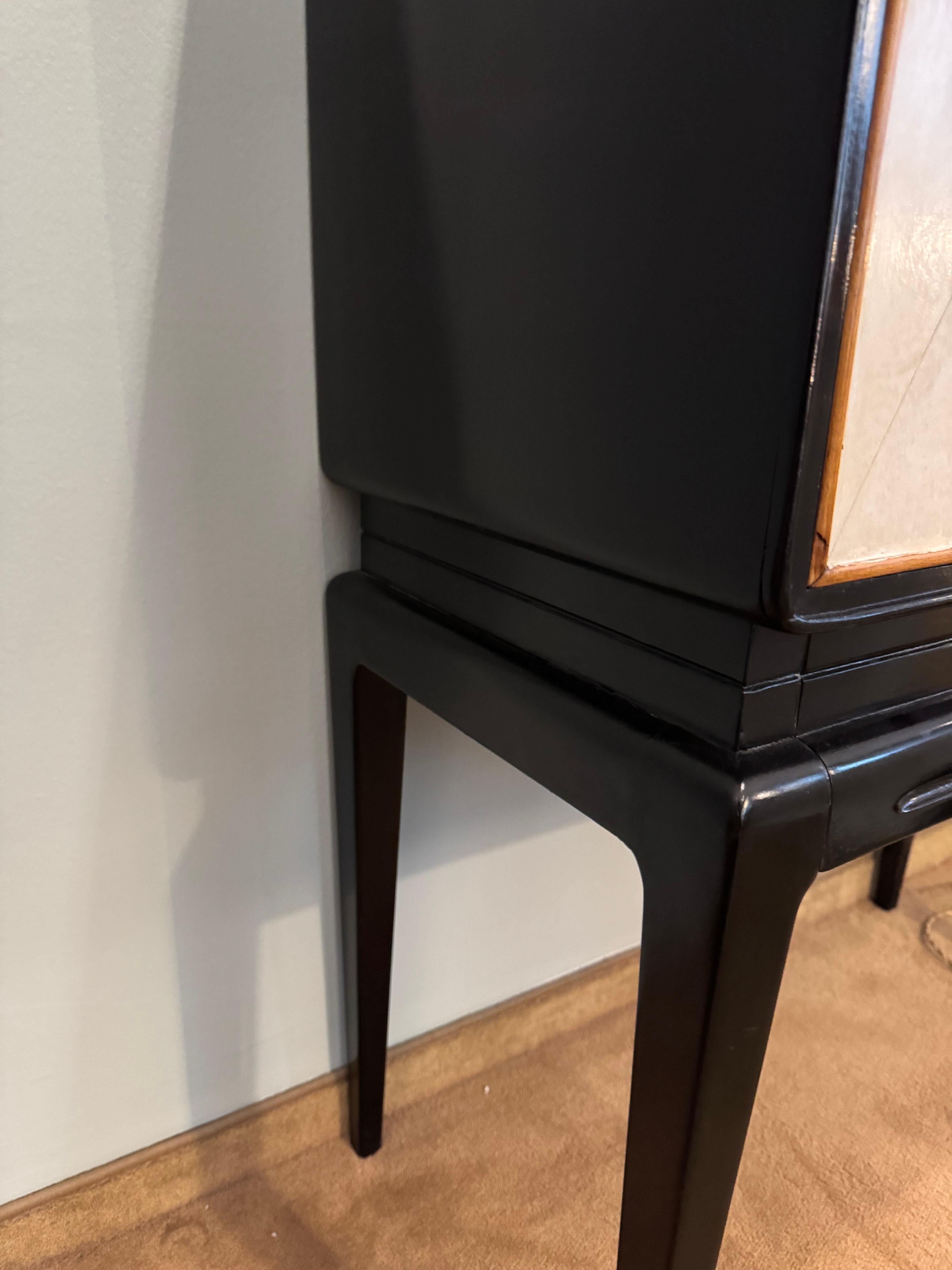 Mid-20th Century Parchment and ebonized wood bar cabinet For Sale