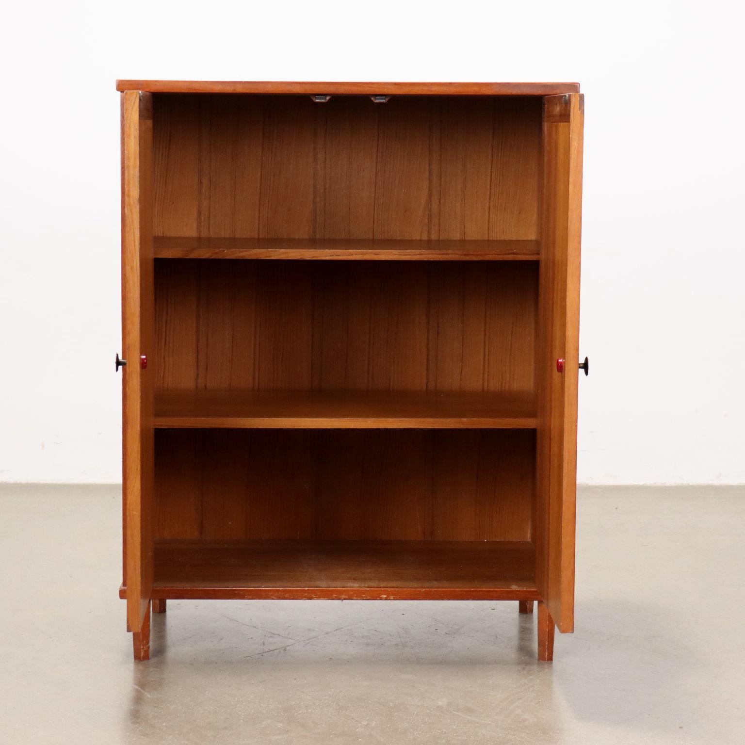 Italian 1960s Teak cabinet with hinged doors For Sale