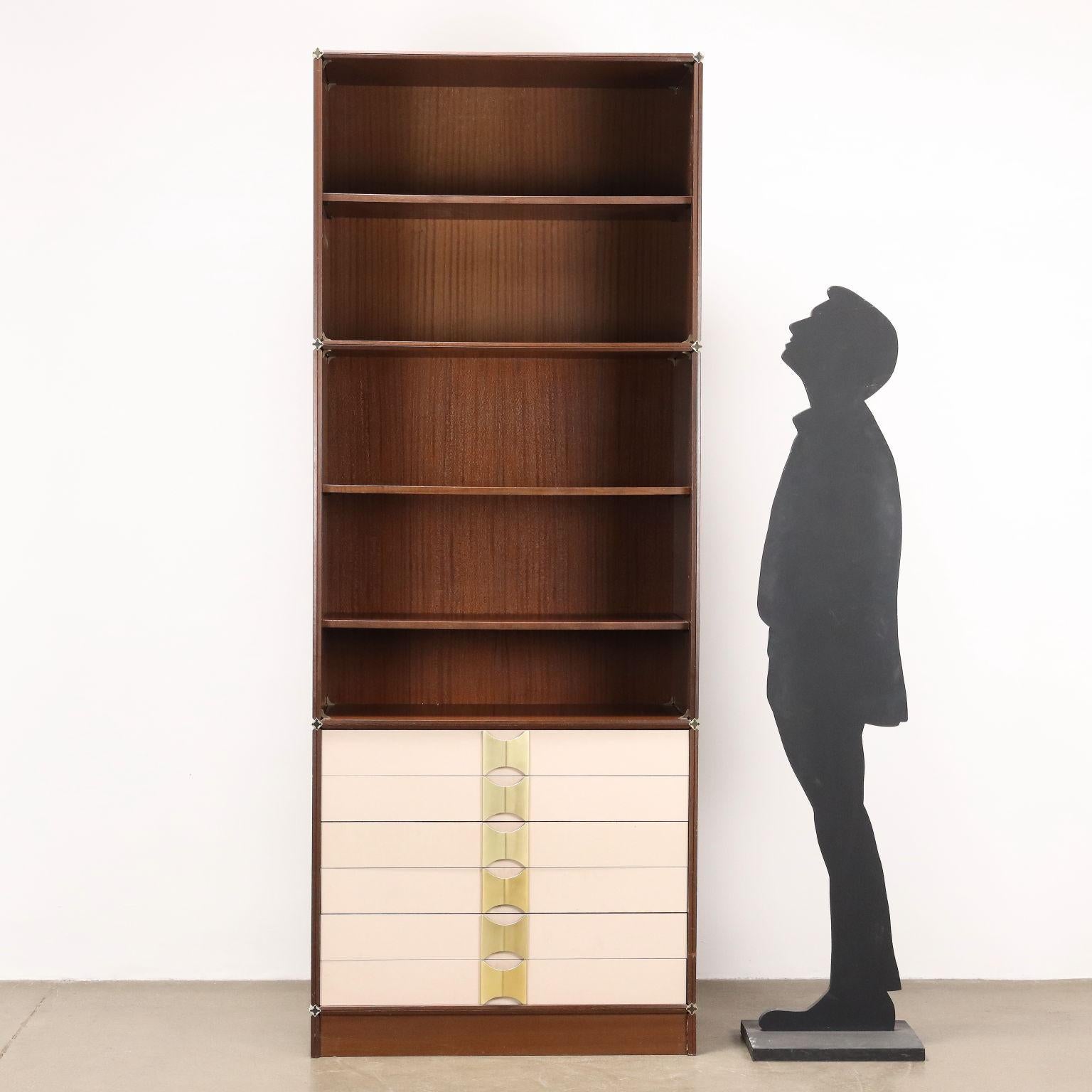 Modular cabinet, with hinged doors and open shelves, mahogany veneered wood, formica drawers, brass-plated aluminum handles. 
