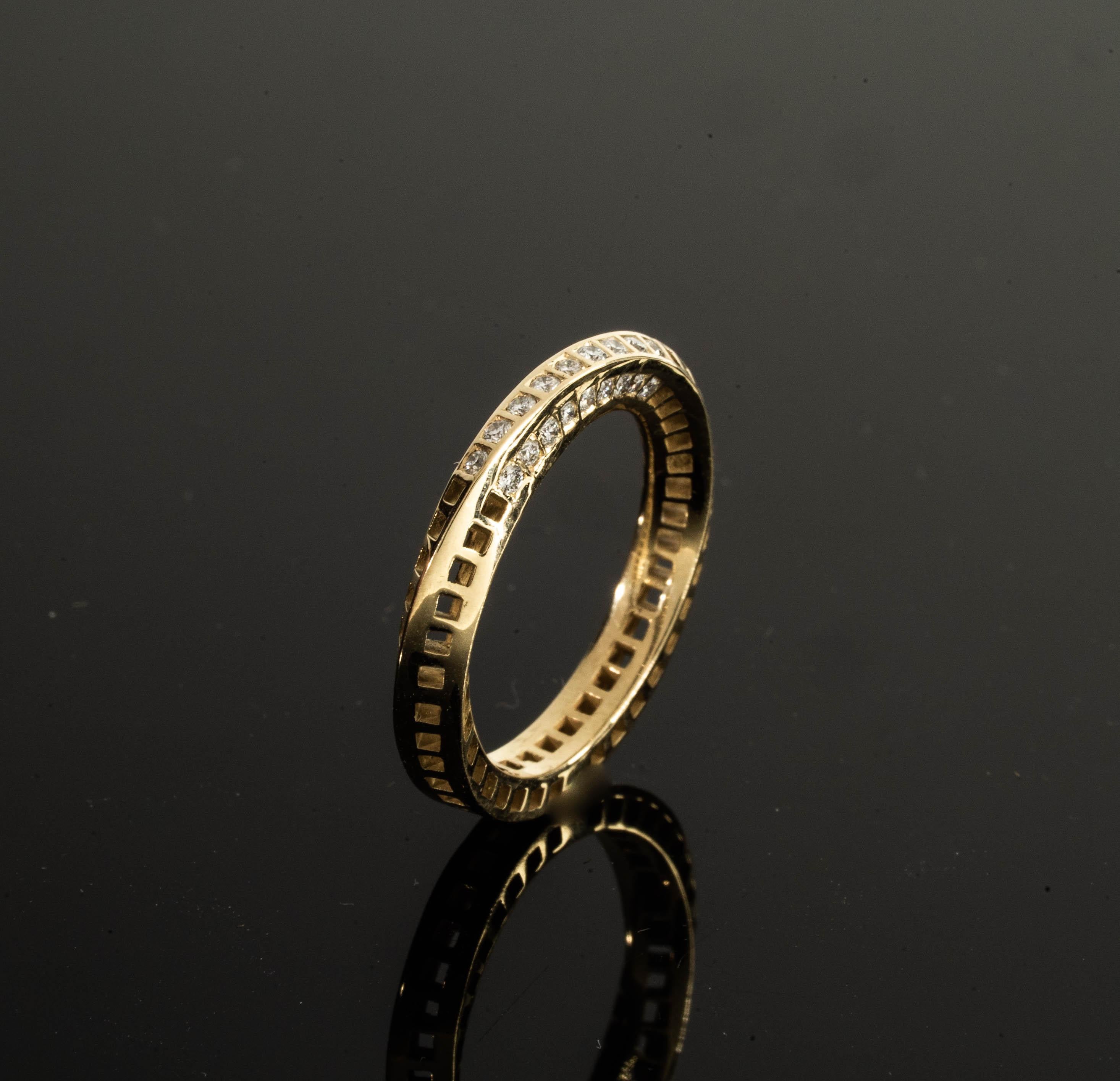 Contemporary 18 Karat Yellow Gold Mobius Band - Squares Holes (without diamonds)