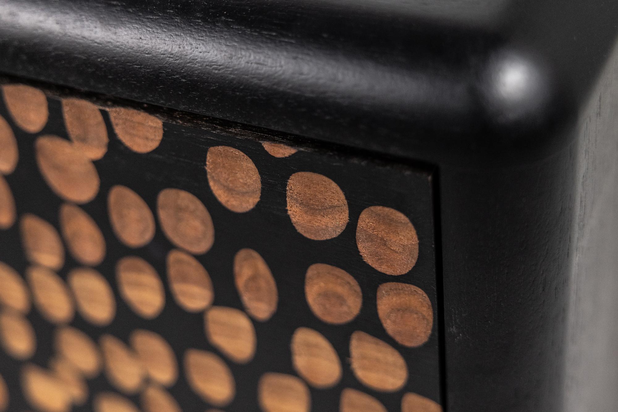 The MK2 Mobley, like its predecessor, features a relief carved front panel, but with more emphasis on contrast and texture.  Each individual divot is planned and hand carved along the front to ensure balance, and no two cabinets are ever the