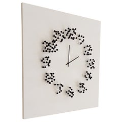 Horloge murale illusionniste "blanc/noir" de Mocap