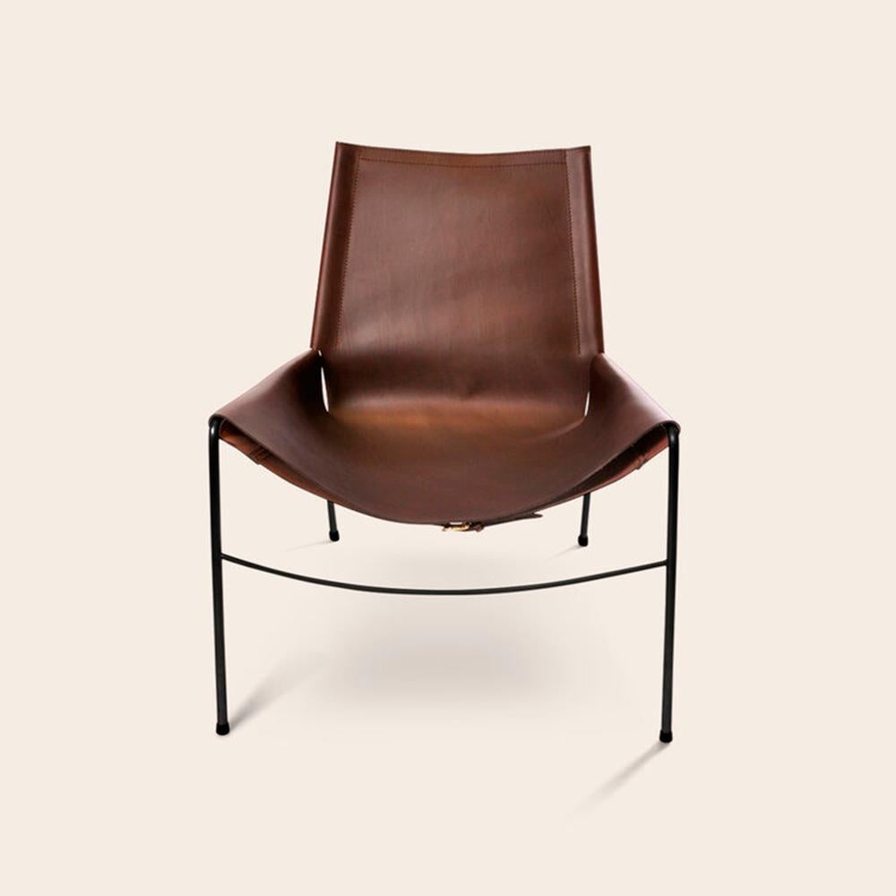 Mocca and Black November chair by OxDenmarq
Dimensions: D 71 x W 76 x H 88 cm
Materials: Leather, Stainless Steel
Also Available: Different leather colors and other frame color available.

OX DENMARQ is a Danish design brand aspiring to make