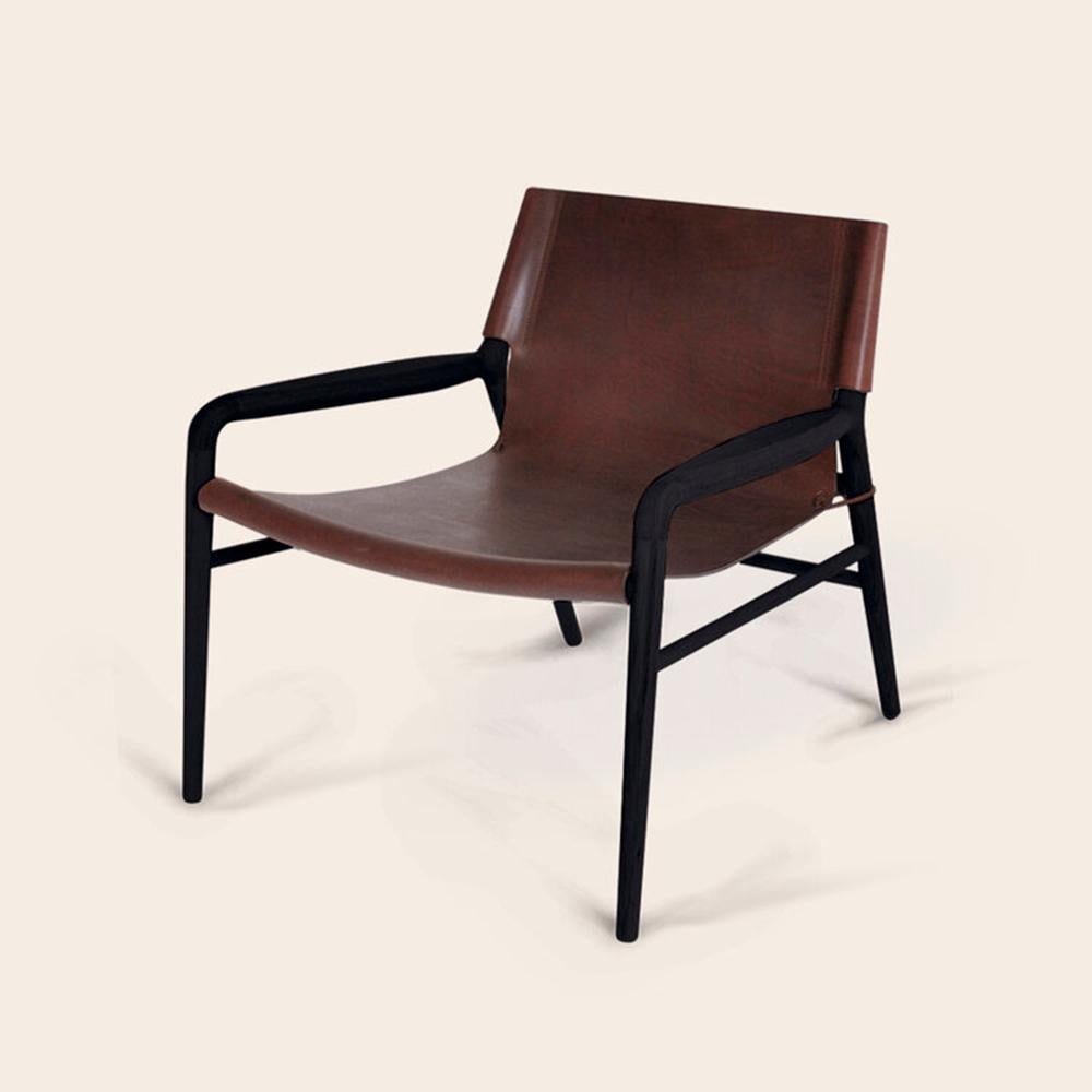 Mocca and Black Rama Oak chair by OxDenmarq
Dimensions: D 72 x W 68 x H 70 cm
Materials: Leather, Wood
Also Available: Different colors available.

OX DENMARQ is a Danish design brand aspiring to make beautiful handmade furniture, accessories