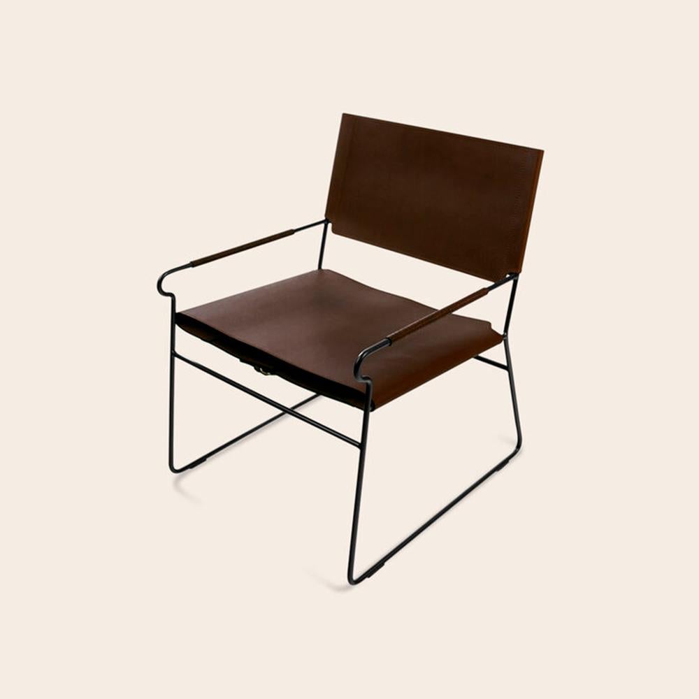 Mocca Next Rest Chair by OxDenmarq
Dimensions: D 66 x W 60 x H 77 cm
Materials: Leather, Black Powder Coated Steel
Also Available: Different leather colors available,

OX DENMARQ is a Danish design brand aspiring to make beautiful handmade