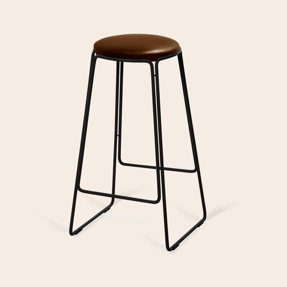 Mocca prop stool by Ox Denmarq.
Dimensions: D 41 x W 41 x H 70 cm.
Materials: leather, black powder coated steel
Also available: different colors available.

Ox Denmarq is a Danish design brand aspiring to make beautiful handmade furniture,