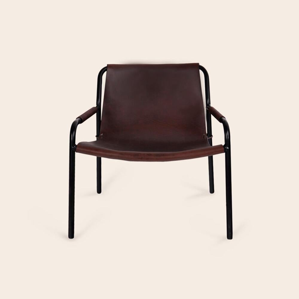Black September Chair by OxDenmarq
Dimensions: D 71 x W 71 x H 70 cm
Materials: Bull Leather, Black Powder Coated Steel
Also Available: Different leather colors available,

OX DENMARQ is a Danish design brand aspiring to make beautiful handmade
