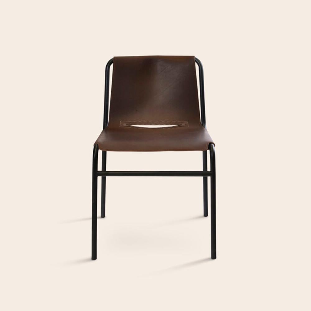 Mocca September Dining Chair by OxDenmarq
Dimensions: D 54 x W 48 x H 80 cm
Materials: Leather, Black Powder Coated Steel
Also Available: Different colors available,

OX DENMARQ is a Danish design brand aspiring to make beautiful handmade