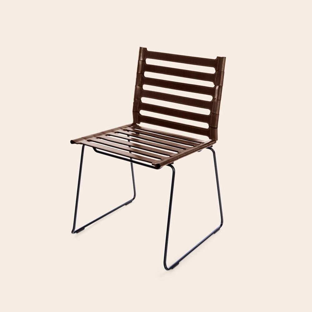 Mocca Strap Chair by OxDenmarq
Dimensions: D 45 x W 48 x H 78.5 cm
Materials: Leather, Black Powder Coated Steel
Also Available: Different colors available,

OX DENMARQ is a Danish design brand aspiring to make beautiful handmade furniture,