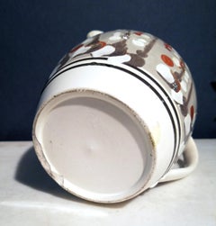 Mocha Creamware Pottery Large Cat's Eye Jug, circa 1800-1820