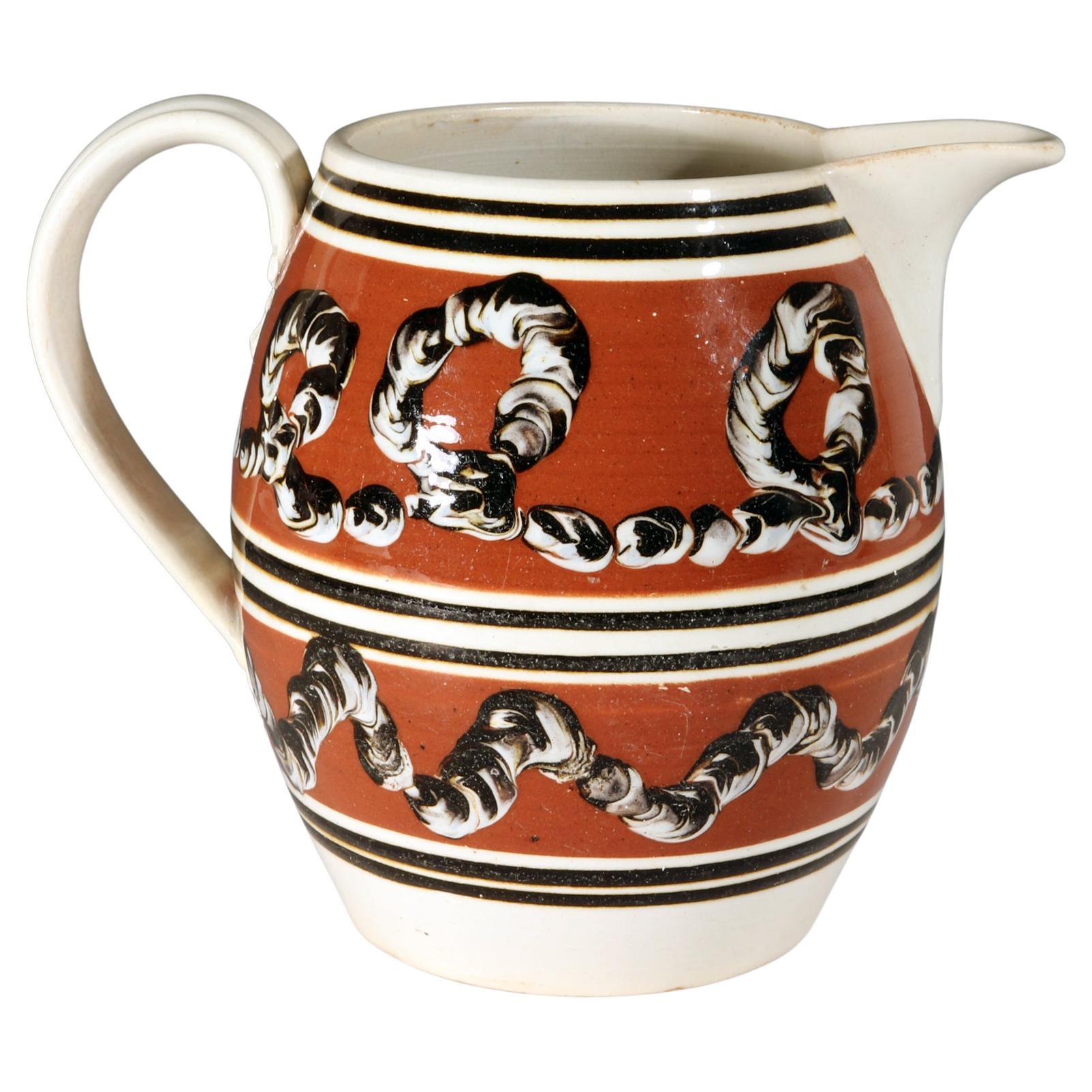 Pichet en poterie moka avec motifs de vers de terre en vente