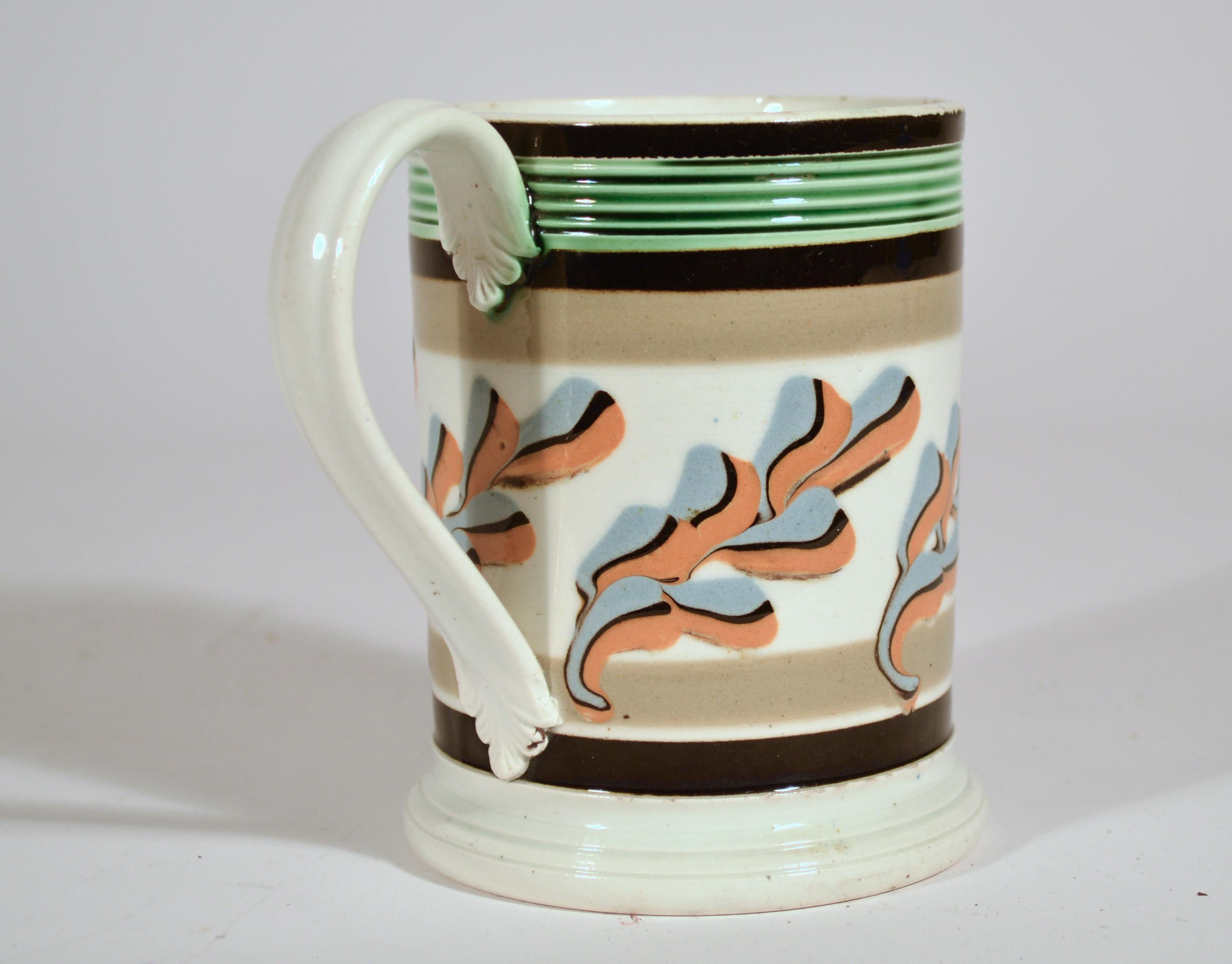 Folk Art Mocha Pottery Mug with Oak Leaf Decoration, Circa 1800