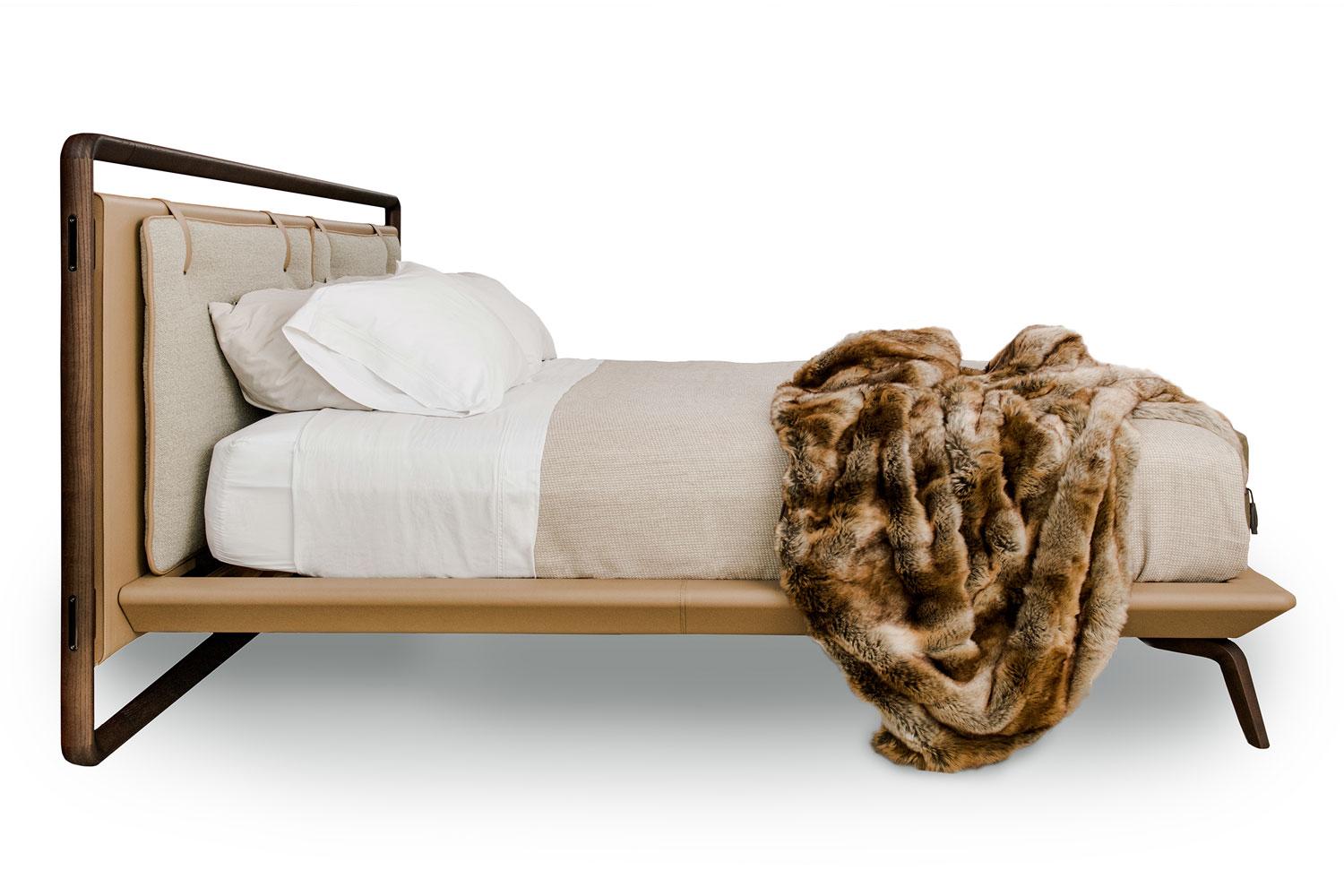 King size Volare Due bed, Poltrona Frau*

The bed frame is in tulipwood and entirely upholstered in camel colored Cuoio Saddle Extra leather, just like the headboard, which is made of solid beech with internal crossbars in birch plywood and infill