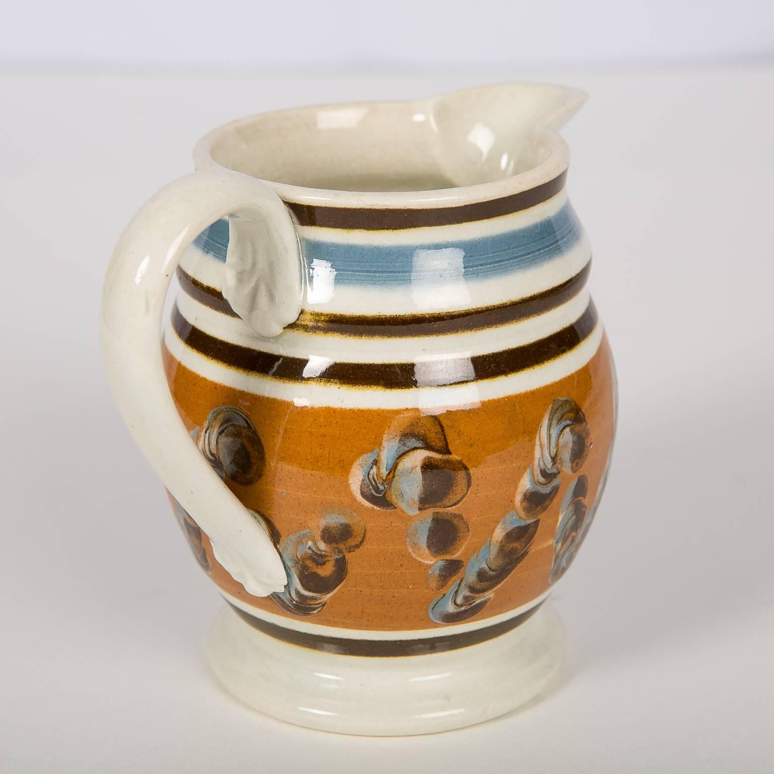 Creamware Mocha Ware Pitcher Decorated with a Cable Pattern