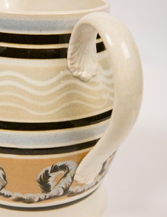 Mochaware Pitcher with Cable and Wavy Line Decoration