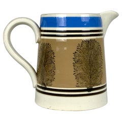 Pichet à mokaware avec arbres fabriqué en Angleterre, vers 1870