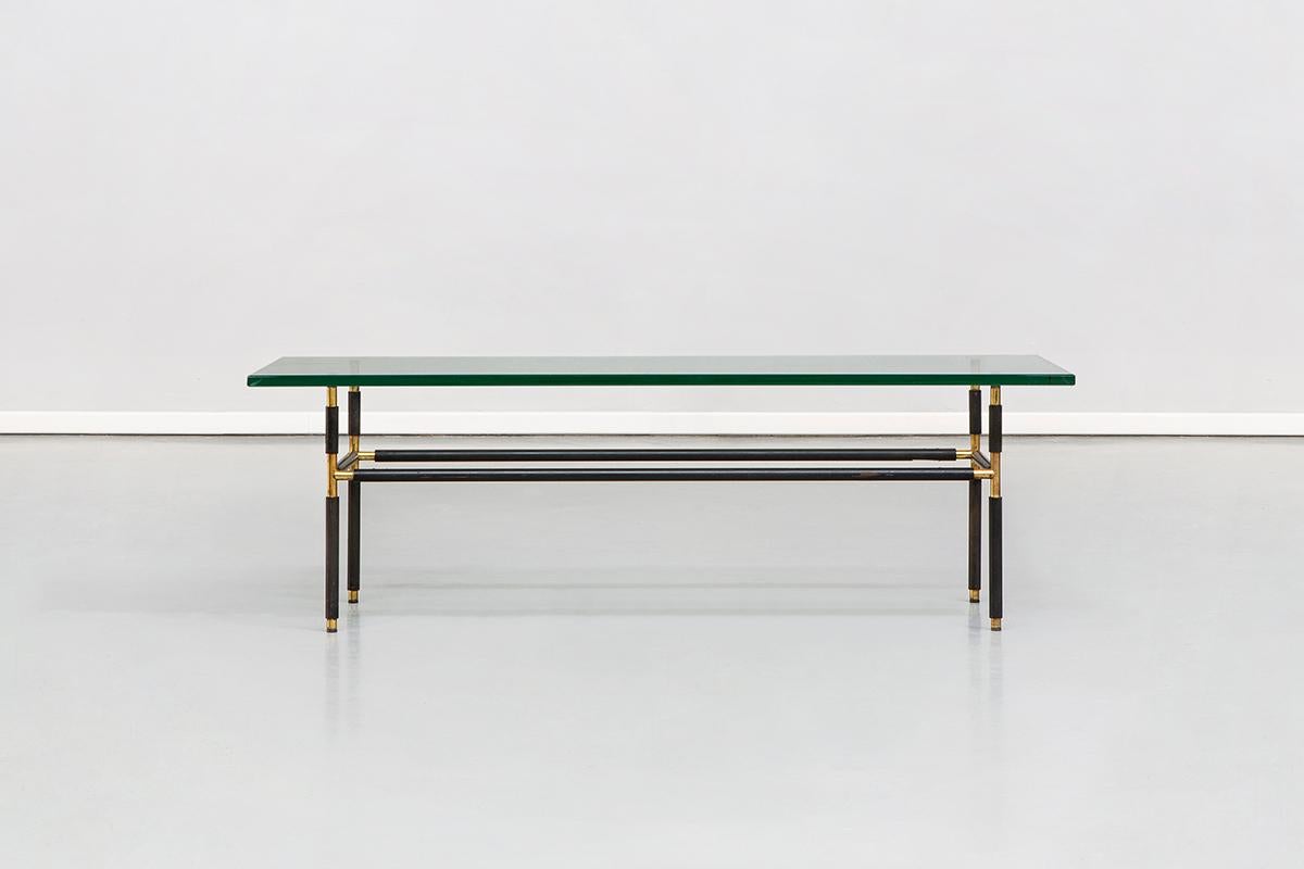 Mod. 1736 coffee table by Pietro Chiesa for Fontana Arte, 1950s
Impressive Italian coffee table from 1950s, designed by Pietro Chiesa for Fontana Arte from fifties.
Structure is in black lacquered metal and brass, while a strong and heavy tray
