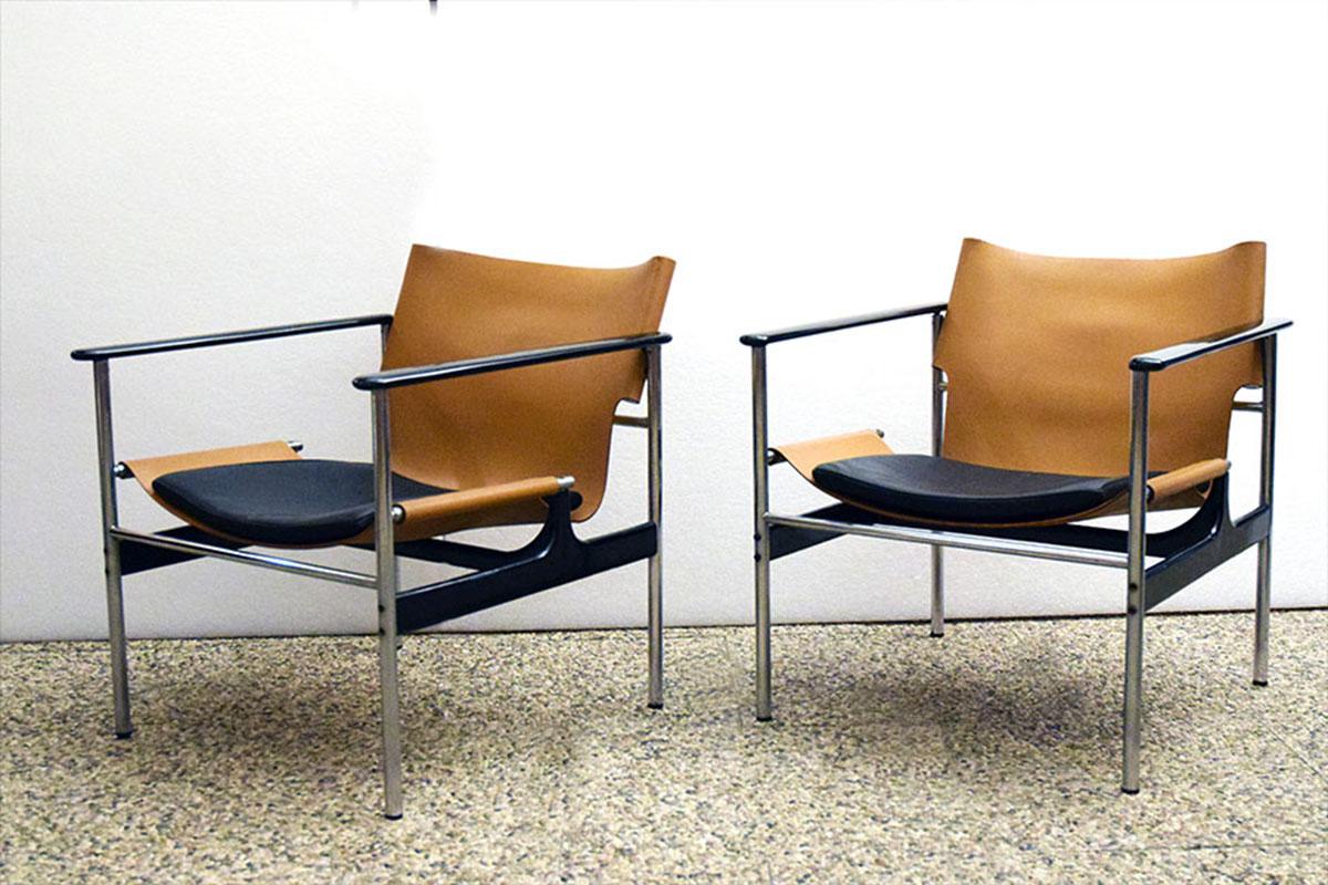 Charles Pollock for Knoll International pair of armchairs 'Sling chair mod. 657, exemplars from the 1960s.
Steel and preformed aluminum frame, cast aluminum arms, and armrests, natural leather seat with leather cushion.
In excellent conditions.
 