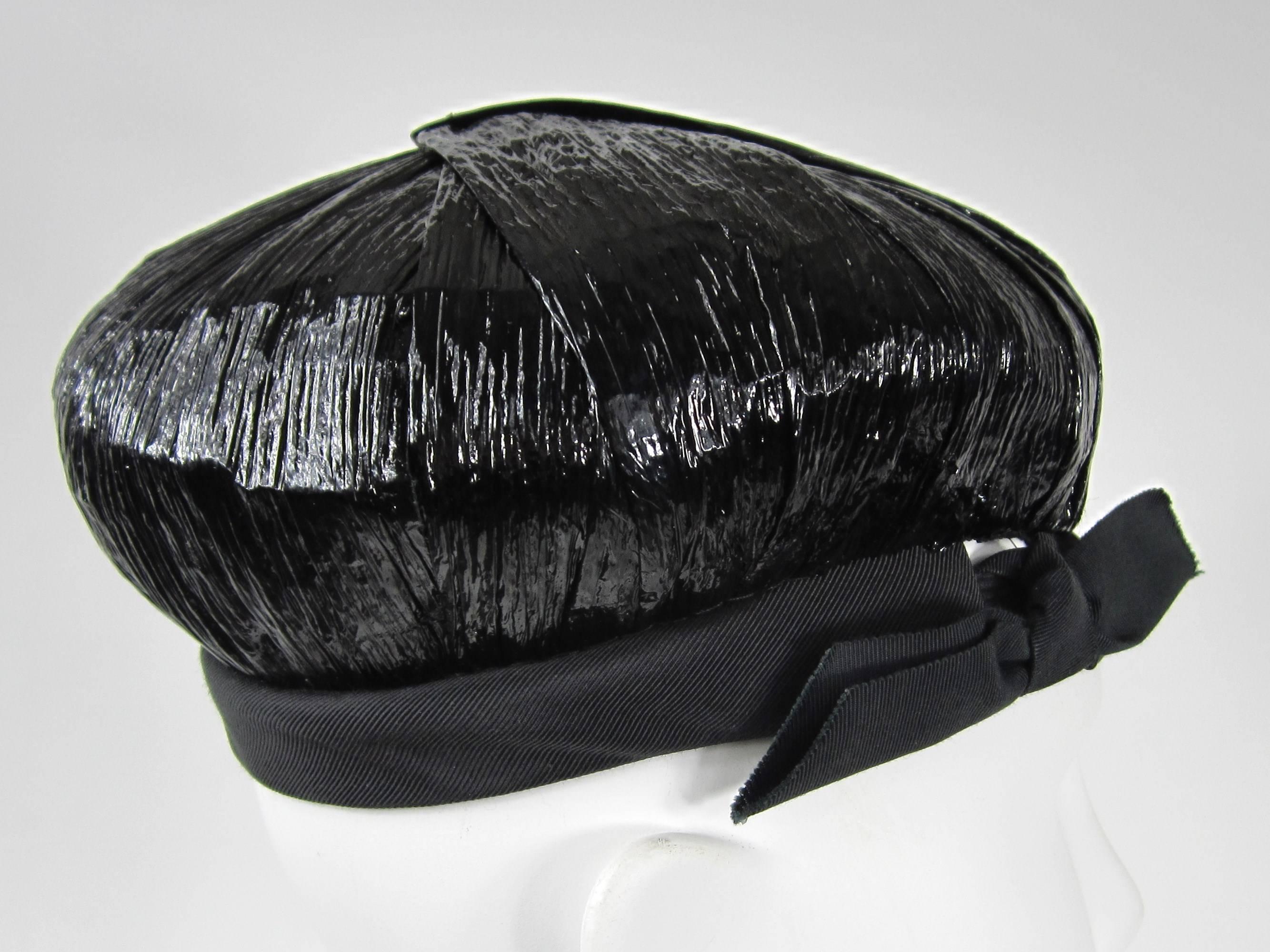 Almost looks like a package has been wrapped! Has a Black with Black Bow Measures 20 in diameter Size XS. Reggi of Wilshire, Paris New York. Please check our storefront for hundreds of items including New, Never worn vintage Jewelry as well as more