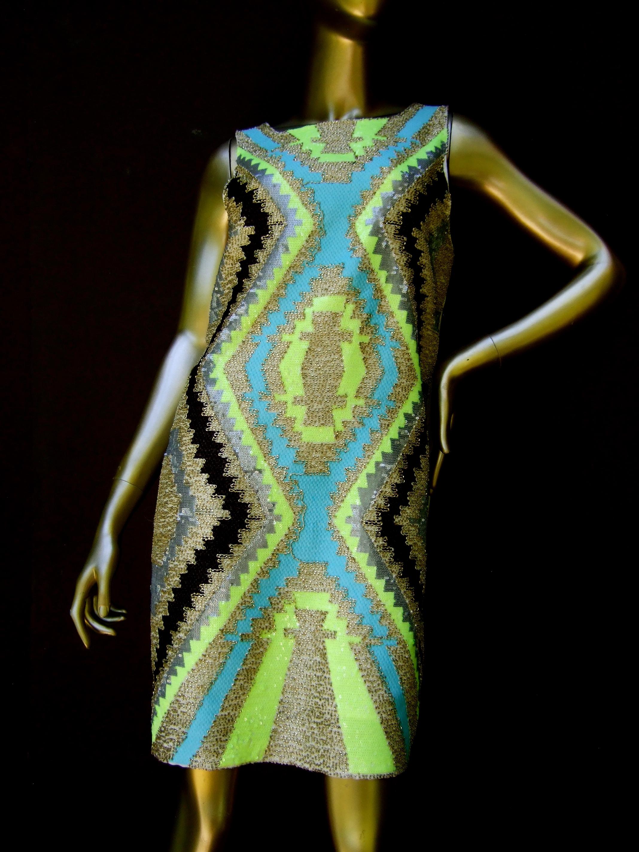  Mod bold beaded & sequinned sleeveless geometric chevron sheath dress designed by Harper 
The stylish loose boxy sac style sheath is designed with a mosaic of gold bugle beads;
combined with silvery gray & lime green small size sequins. Juxtaposed