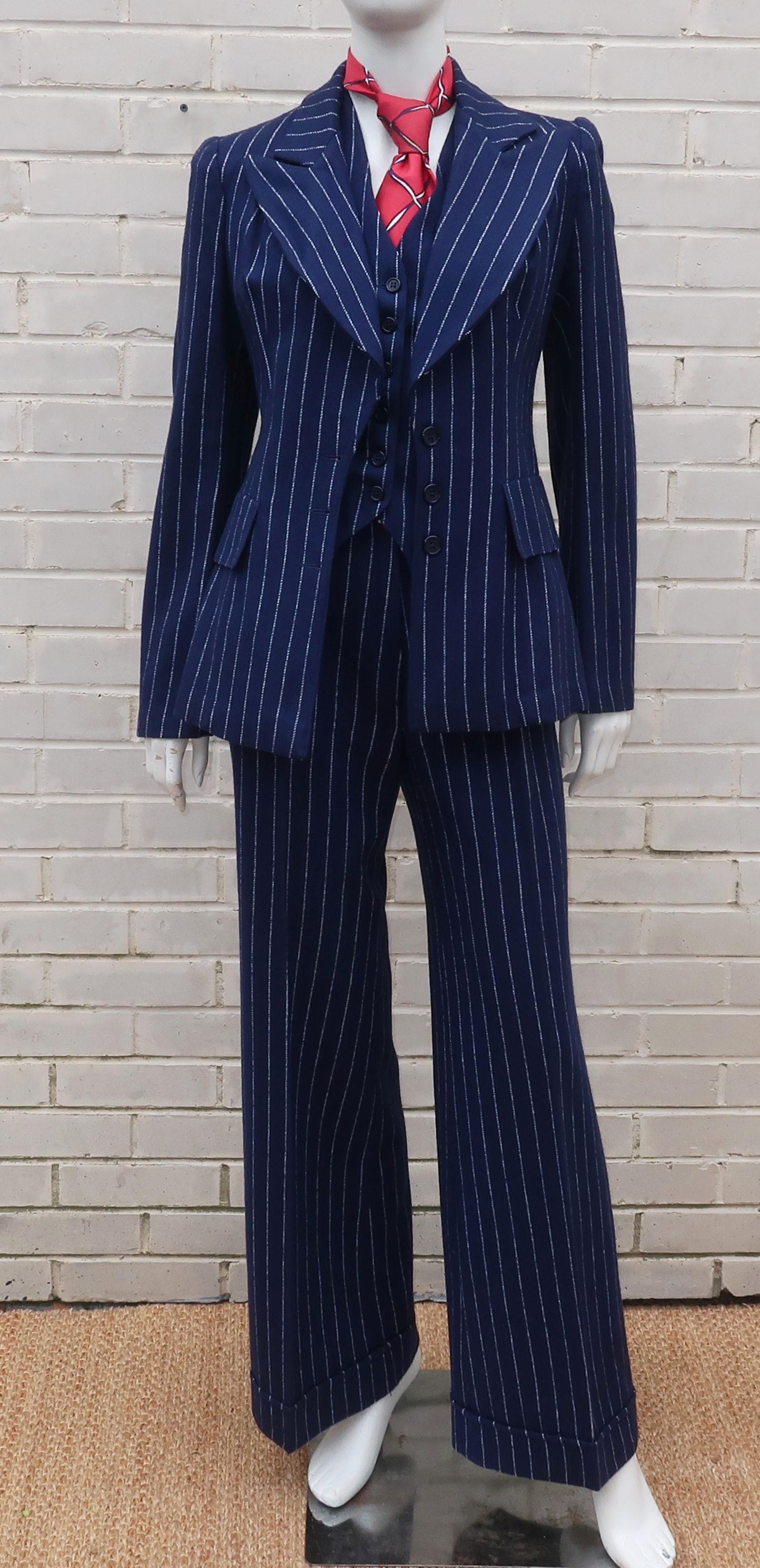 This C.1970 Stirling Cooper three piece wool suit takes you straight back to the swinging London scene of the late 1960’s ... the era of fashionable rockers, Biba and the androgynous look.  The period perfect mod details include a wide lapel, pointy