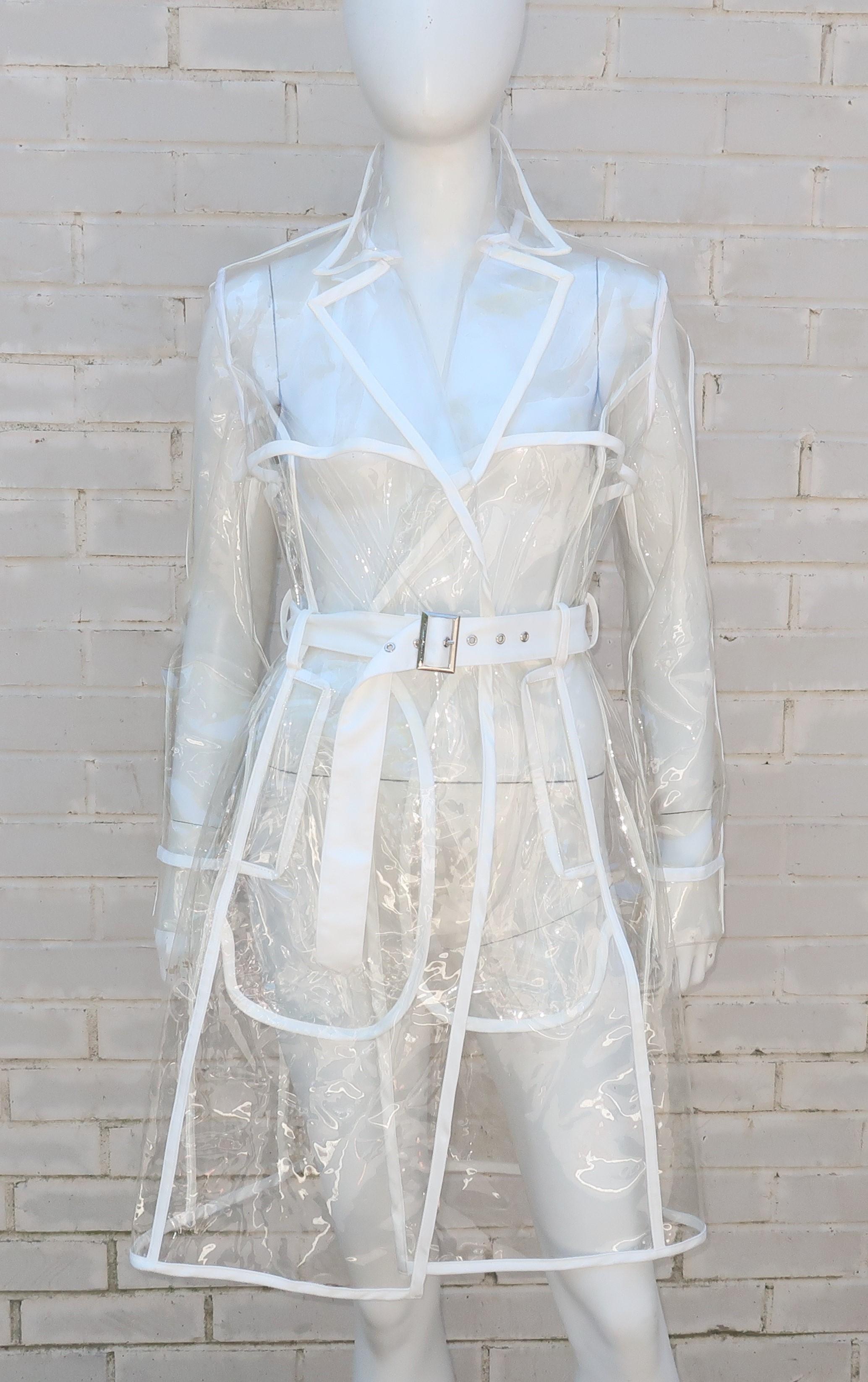 This one is just for fun!  A great mix of classic trench coat styling and a nod to the space age looks of the 1960's ... this clear vinyl raincoat with white satin piping has it all.  Made for Mistress Rocks in Los Angeles and acquired from the