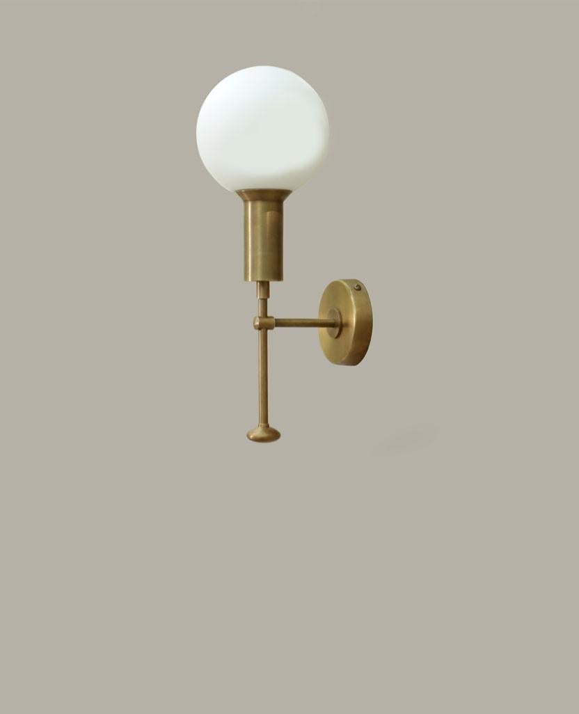 Mod Glass Globe Wall Sconce by Lamp Shaper
Dimensions: D 14 x W 18 x H 38 cm.
Materials: Brass and glass.

Different finishes available: raw brass, aged brass, burnt brass and brushed brass Please contact us.

All our lamps can be wired according to