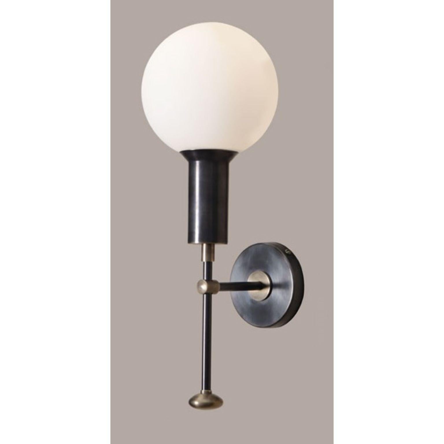 Mod Glass Globe Wall Sconce by Lamp Shaper
Dimensions: D 14 x W 18 x H 38 cm.
Materials: Brass and glass.

Different finishes available: raw brass, aged brass, burnt brass and brushed brass Please contact us.

All our lamps can be wired according to
