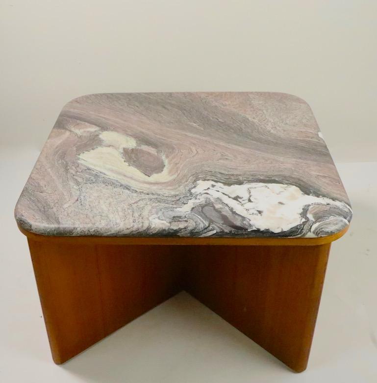 Stylish and cool midcentury marble-top table made in Sweden by Bendixen. Exceptional swirl marble top rests on architectural X-form teak base. Free of damage, repairs, or condition issues, shows only light cosmetic wear, normal and consistent with