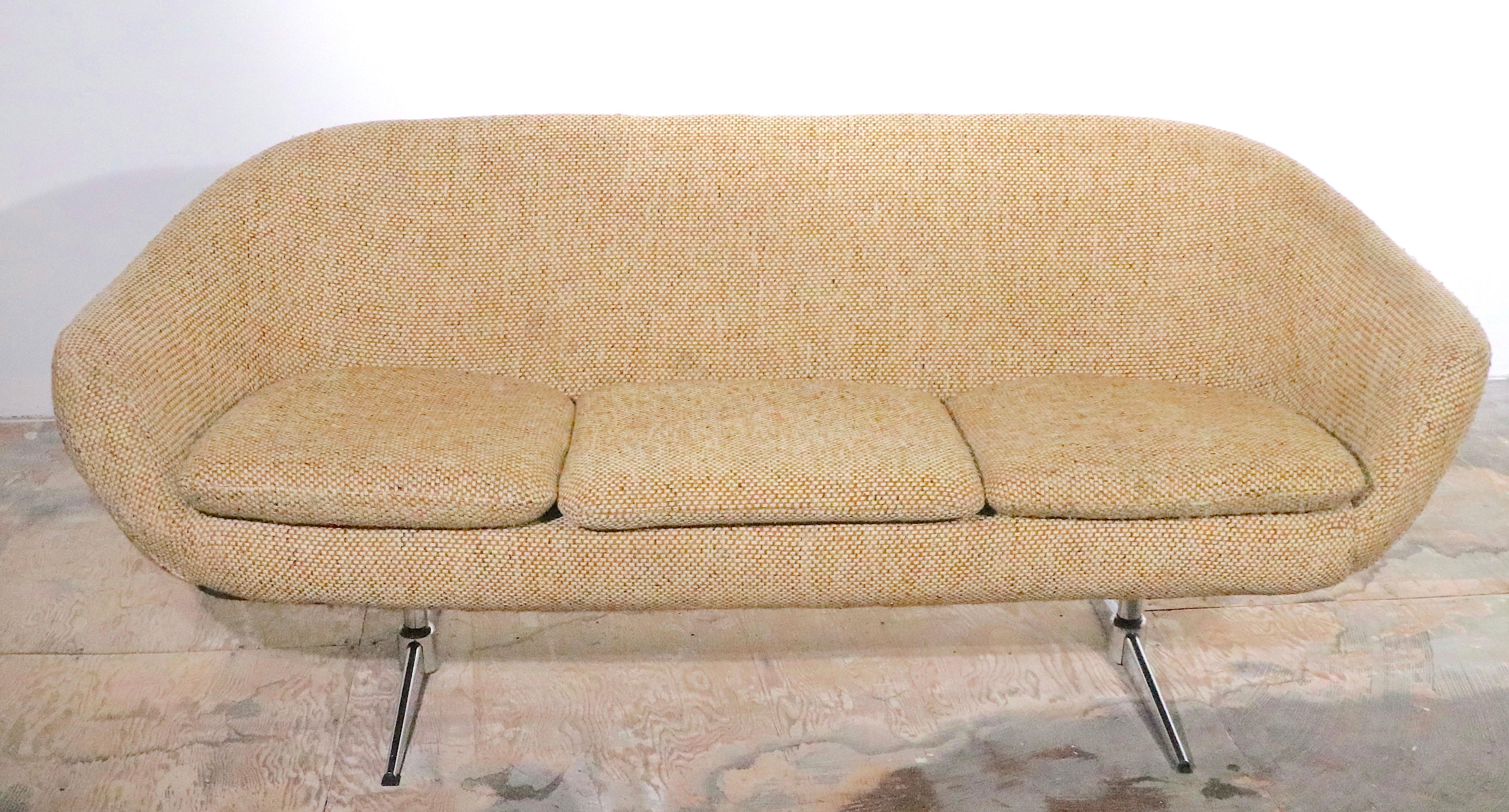 Classic Overman Pod sofa, in original tweed fabric upholstery, on bright chrome legs. The sofa is in good usable condition, the fabric has some flaws, which can be negated by using the good side of the the cushions, or you can have the piece