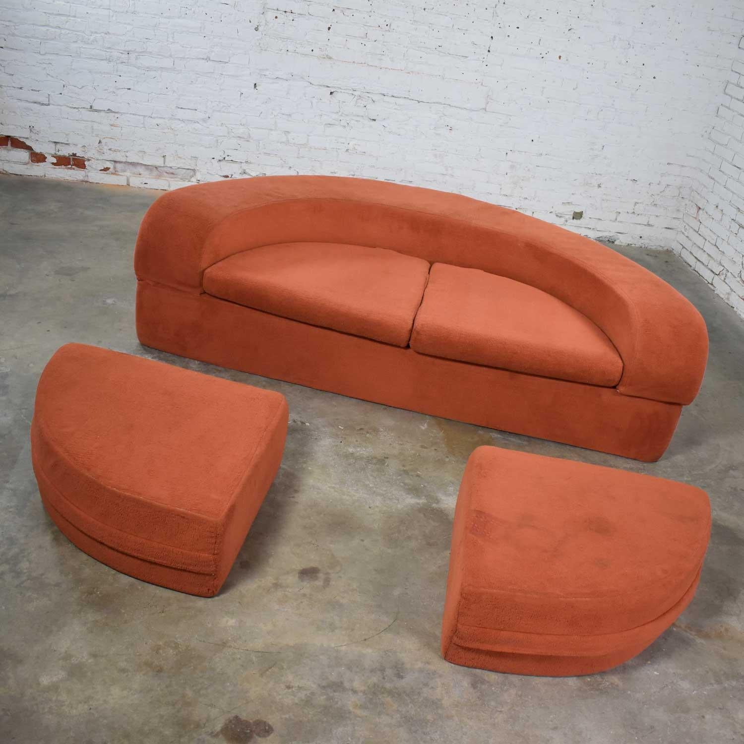 Fun and funky mod round foam sleeper sofa with ottomans in its original orange fuzzy fabric by Spherical Furniture of Boone, North Carolina. It is in good vintage condition. Its original upholstery has been professionally cleaned. Unfortunately, in