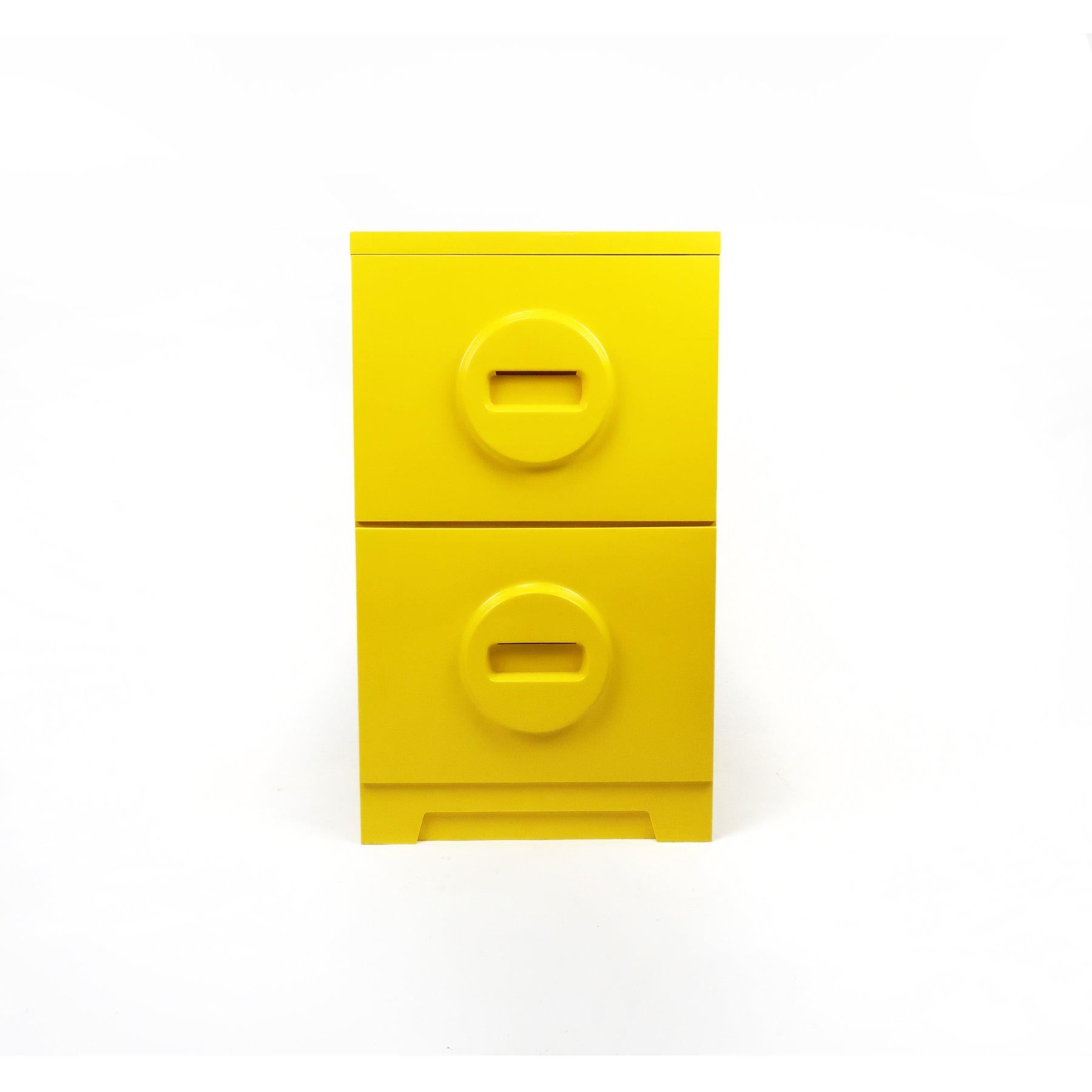 File in style with a stunning 1970s Akro-Mils plastic filing cabinet in bright yellow. Two drawers with a cool Lego-esque handle on each. Get organizing with this amazing mid-century modern design!
 
 In excellent vintage condition. Slight