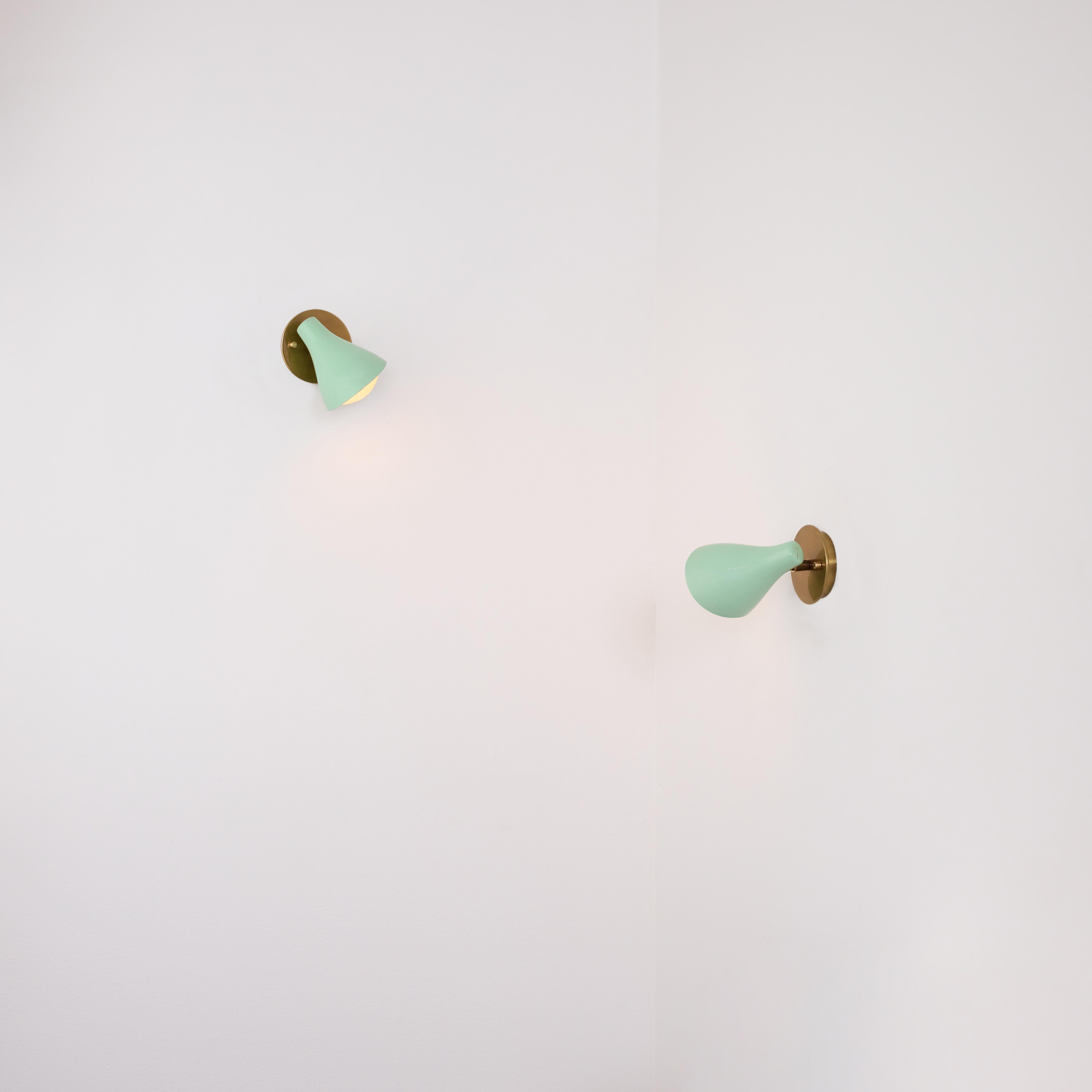 Model 10 'Lilly' Sconces by Gino Sarfatti for Arteluce (IT, c. 1940s)

Mint green pastel shades with a bottom curved detail. Brass accents. Each sconce holds a single E14 socket-type, adapted for the US. Rewired for the US. We recommend a single 40w