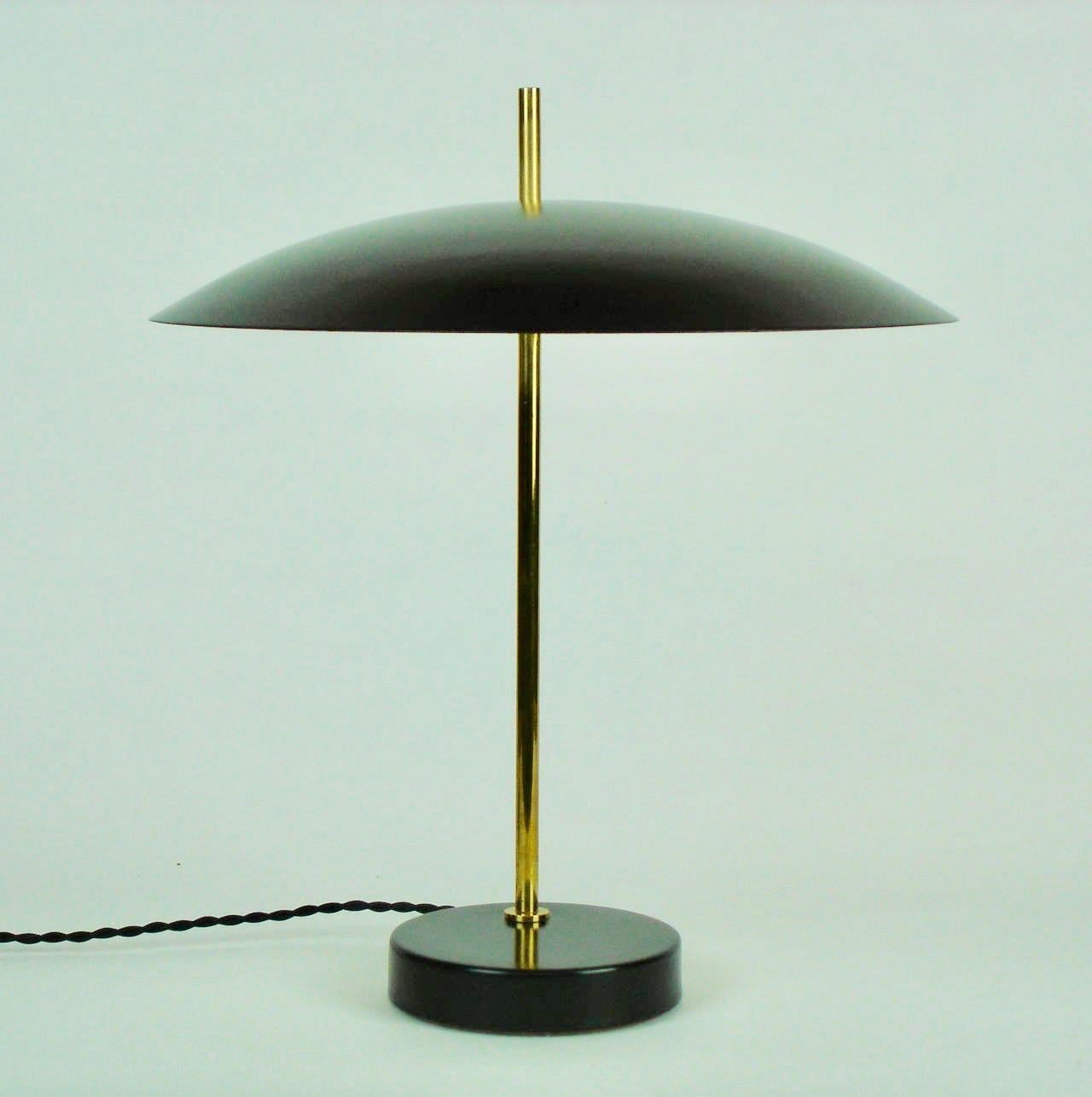 This lighting fixture was originally conceived as a desk lamp, with its' ideal height and even lighting to avoid eye fatigue. Its' elegant design and size made it an iconic object to place anywhere: In the bedroom, on furniture in the sitting room,