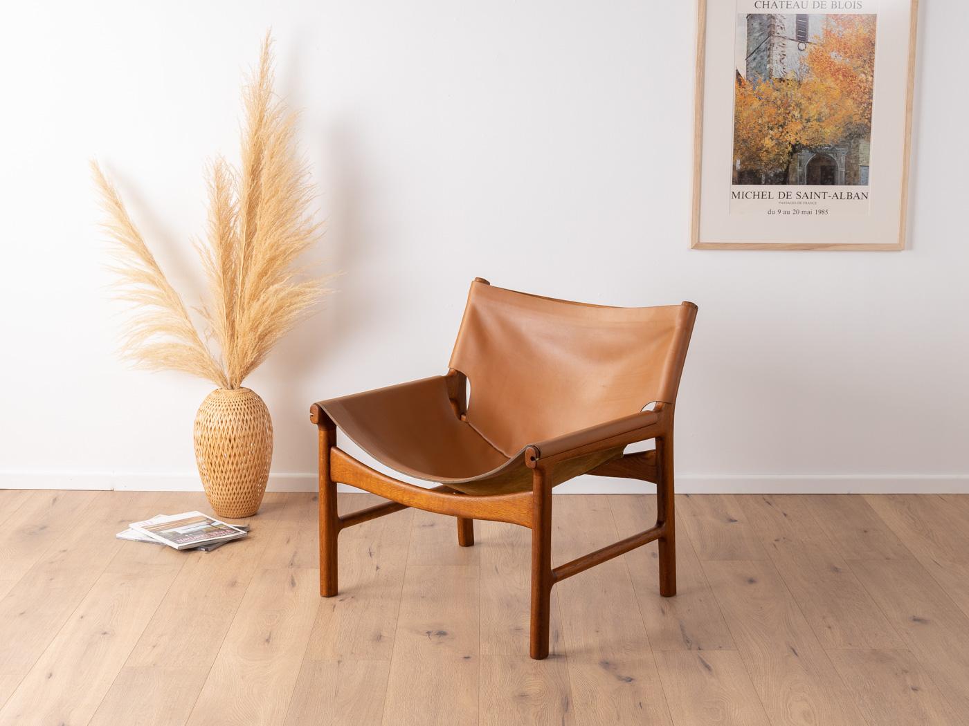 Model 103 Lounge Chair by Illum Wikkelsø for Mikael Laursen. High-quality frame made of solid teak with original seat and backrest made of cognac brown thick leather.

Quality Features:
 accomplished design: perfect proportions & visible