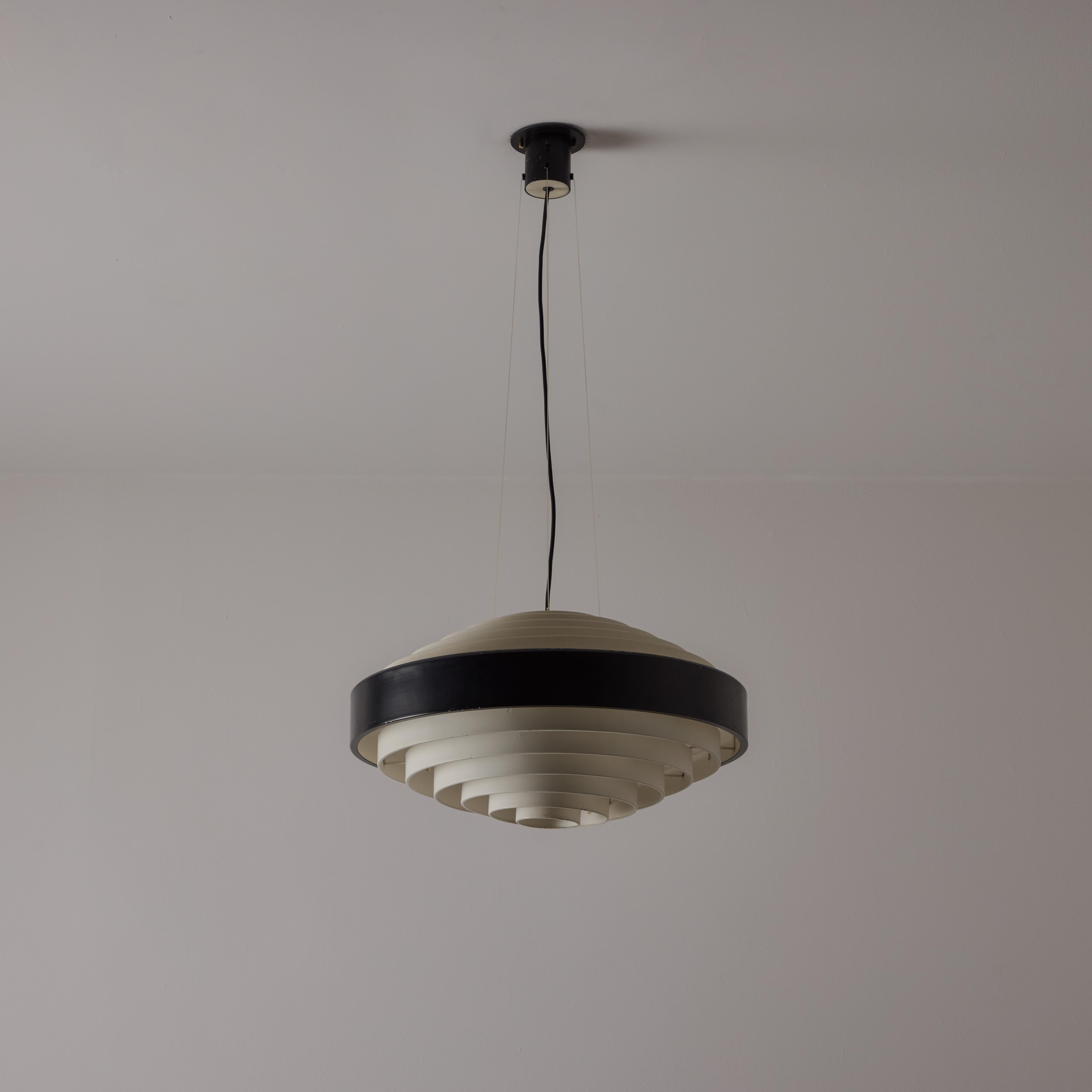 Model 1088 Ceiling Light by Bruno Gatta for Stilnovo. Designed and manufactured in Italy, in 1958. An oval pendant comprising of black and white tiered banding working from the center. The suspension features a few plastic lines and a black cord.