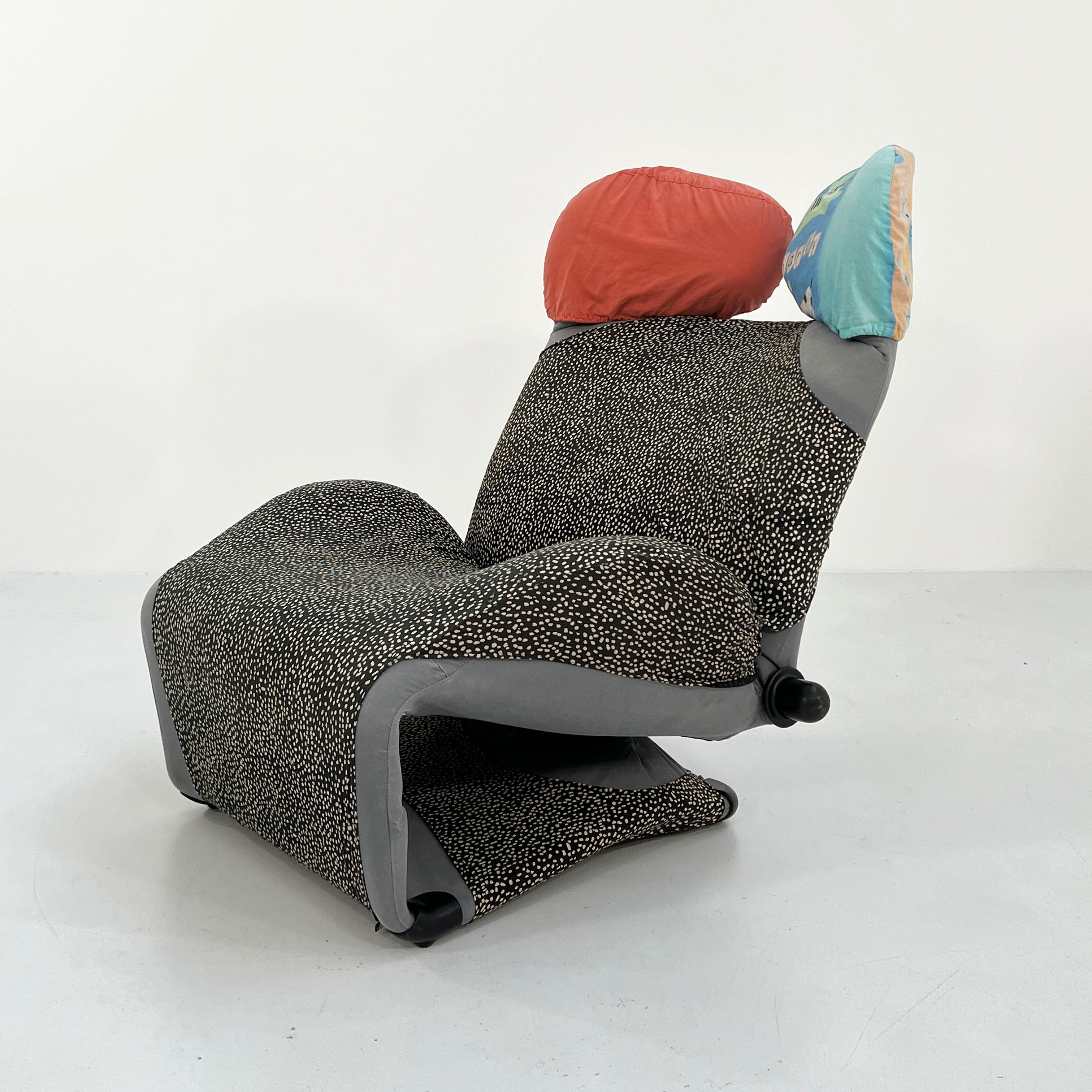 Designer - Toshiyuki Kita
Producer - Cassina
Model - Model 111 Wink Lounge Chair 
Design Period - Eighties
Measurements - Width 84  cm x Depth 100/160 cm x Height 98 cm x Seat Height 45 cm
Materials - Fabric, Foam
Color - Grey, Blue, Salmon
