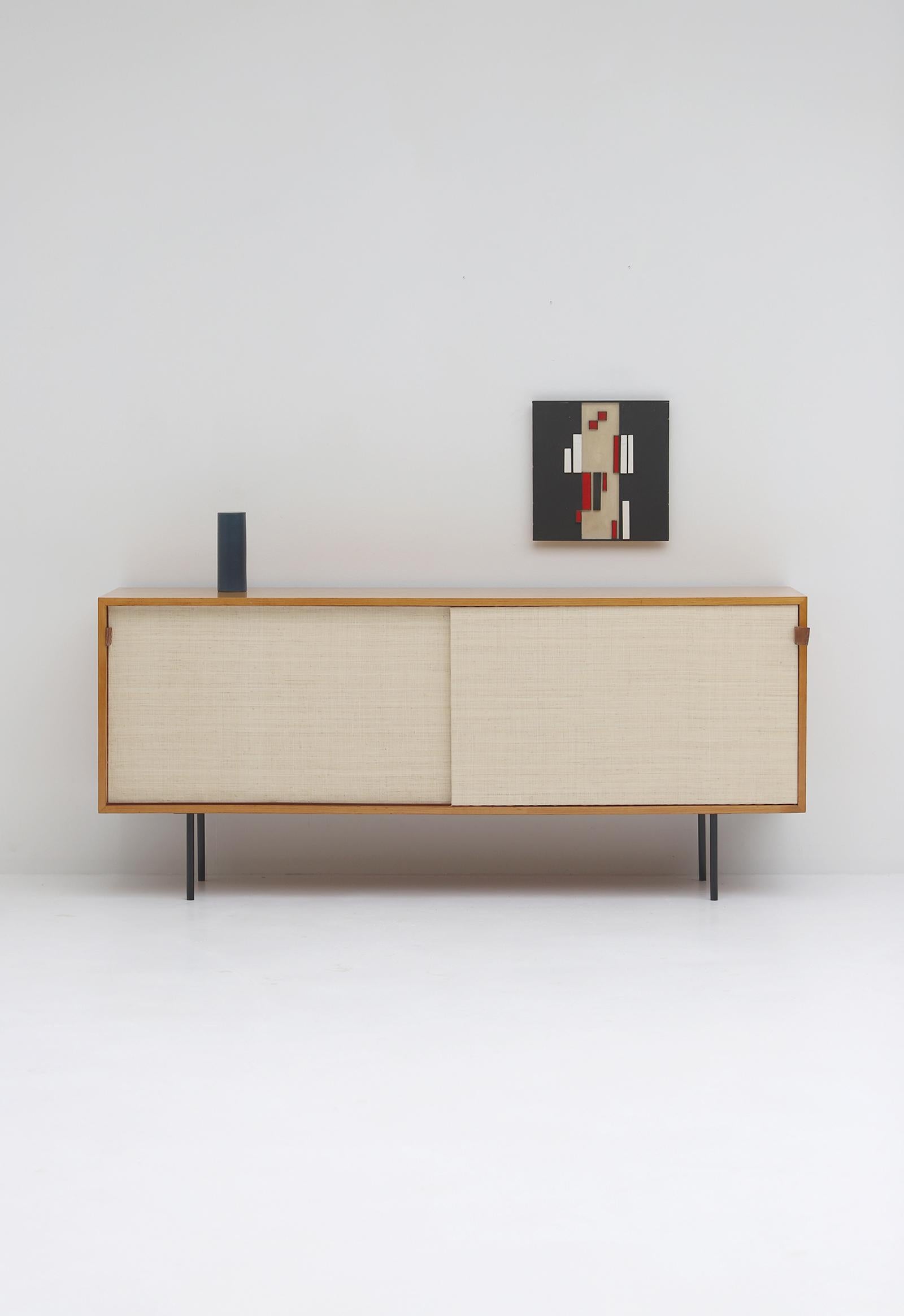 Decorative sideboard model 116 designed by Florence Knoll in the early fifties for Knoll associates. Florence Knoll studied architecture under Ludwig Mies van der Rohe and Eliel Saarinen before joining her husband in the company. Florence Knoll took